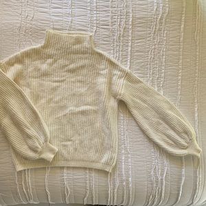 Cream sweater with balloon sleeves and a mock neck! Perfect Fall staple